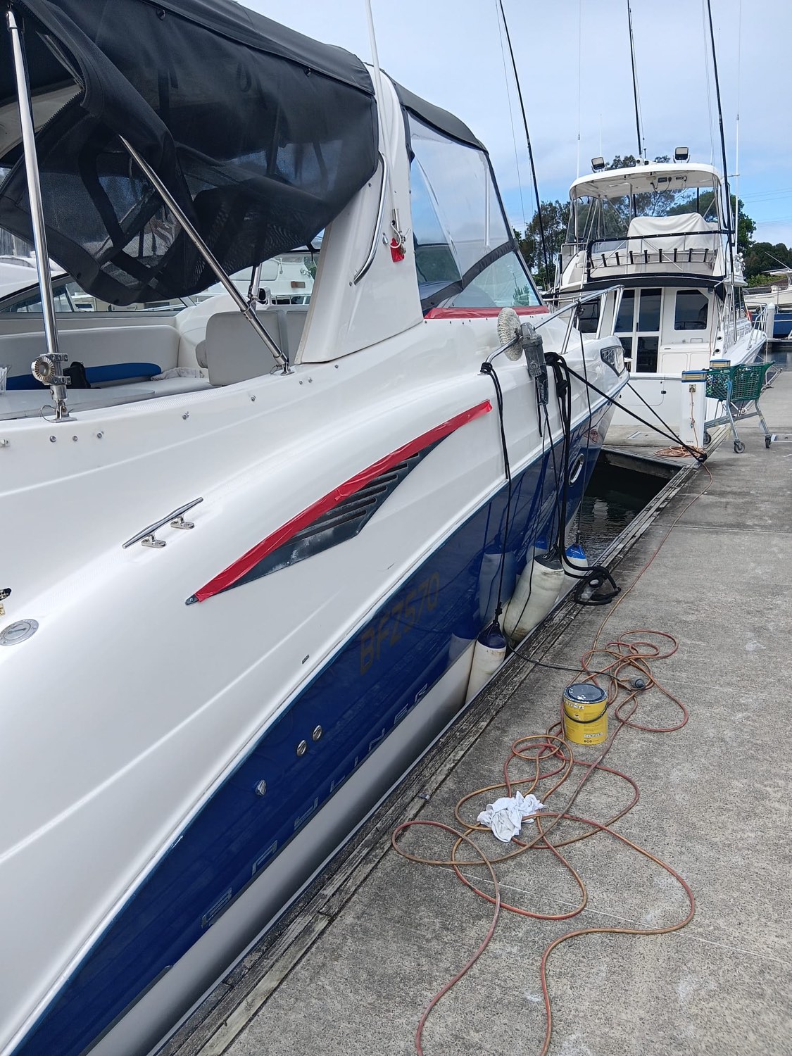 Swift Trawler 48 alongside, topsides finished to a full gloss